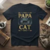 Papa Cat t-shirt with golden text and a silhouette of a walking cat on a dark background