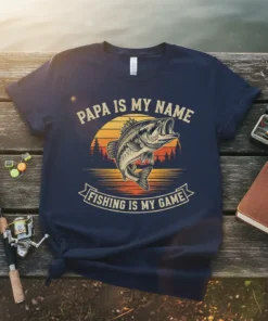 Navy blue t-shirt with vintage sunset graphic, featuring a jumping bass and the text "Papa Is My Name Fishing Is