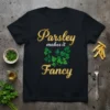 Black t-shirt with gold text "Parsley Makes It Fancy" and a green parsley graphic