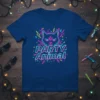 Neon "PARTY Animal" text with a stylized cat face and lightning bolts graphic on a blue t-shirt