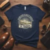 Navy t-shirt featuring "Patron Saint of Quality Footwear St. Hubbins" text and a vintage wingtip shoe graphic
