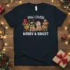 PAW-LIDAYS MERRY & BRIGHT text with four dogs wearing Christmas hats and lights on a black t-shirt