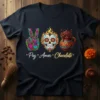 Paz Amor Chocolate t-shirt design with a peace sign, flaming sugar skull, and hot chocolate mug