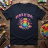 Peace & Love text above a colorful, meditating frog giving a peace sign on a navy t-shirt