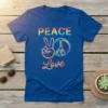Peace Love t-shirt design with colorful typography, peace sign, and hand gesture on a blue shirt