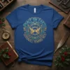 Peace on Earth Goodwill Toward Men quote with two doves and ornate circular design on a blue t-shirt