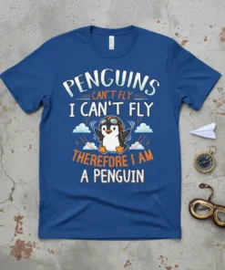 Penguins Can't Fly I Can't Fly Therefore I Am A Penguin text design on a blue t-shirt featuring a cute