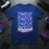 Pew Pew Pew Reload text design on a navy blue t-shirt with neon blue and pink circuitry graphics