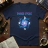 Phase Cycle t-shirt with a blue and purple cosmic swirl and detailed moon phases graphic