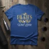 Pilates Now Wine Later quote on a royal blue t-shirt with gold and white lettering, featuring grapevines and a wine