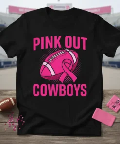 Black t-shirt with pink text "PINK OUT COWBOYS" and a pink football with a pink ribbon