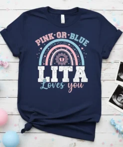 Navy t-shirt with "PINK OR BLUE LITA Loves you" text and rainbow graphic, gender reveal theme