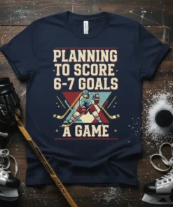 Navy t-shirt with "PLANNING TO SCORE 6-7 GOALS A GAME" text and a hockey player graphic