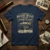 Navy blue t-shirt with "Please Be Patient Witent With Me I'm From The 1900s" text and a vintage airship graphic