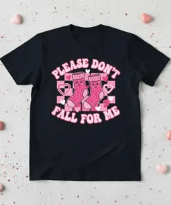 T-shirt with "Please Don't Fall For Me" text and cute pink socks graphic, surrounded by hearts and checkered pattern
