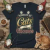 T-shirt design with text "Powered by Cats AND Gnomes", featuring paw prints, decorative vines, mushrooms, and gnome illustrations
