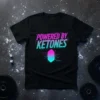 Powered by Ketones t-shirt with neon pink and blue text and a crystal graphic