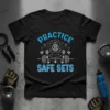 Black t-shirt with blue text "PRACTICE SAFE SETS" and graphics of gym equipment like barbells, dumbbells, and kettlebells