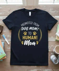 Promoted from Dog Mom to Human Mom t-shirt with gold paw prints and baby footprints graphic