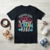 Promoted from Dog to Nana to Human Nana text design with paw prints and hearts on a dark t-shirt