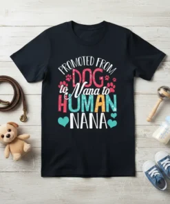 Promoted from Dog to Nana to Human Nana text design with paw prints and hearts on a dark t-shirt