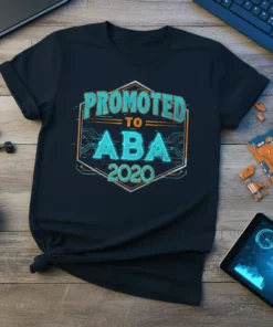 Promoted to ABA 2020 text design on a dark t-shirt, featuring futuristic circuit board graphics and bold lettering