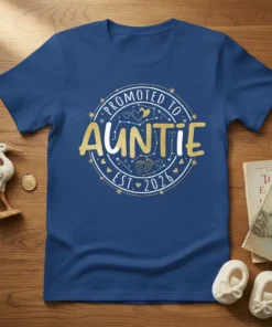 Promoted to Auntie Est. 2026 circular design with gold glitter text and baby footprint graphics on a navy blue t-shirt