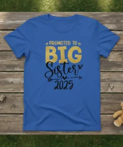 Promoted to BIG Sister 2025 text design with gold glitter and black script on a blue t-shirt, announcing sibling status