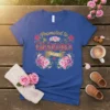 Promoted to Grandma Again t-shirt with floral accents and gold lettering for new grandmothers