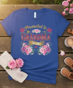 Promoted to Grandma Again t-shirt with floral accents and gold lettering for new grandmothers
