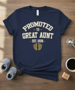 Promoted to Great Aunt Est 2026 t-shirt with decorative footprints and vintage text