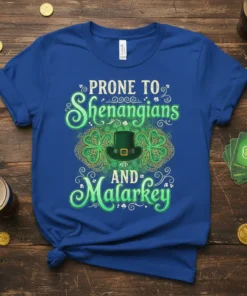 Prone To Shenanigans And Malarkey quote with shamrocks and a green top hat on a blue t-shirt