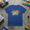 Proud Ally text within a rainbow heart graphic on a blue t-shirt