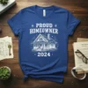 Proud Homeowner 2024 text with a sketch of a house on a blue t-shirt