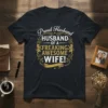 Proud Husband Husband Of A Freaking Awesome Wife text design on a black t-shirt with ornate gold accents and lion