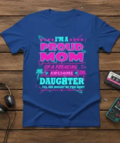 I'm a Proud Mom of a Freaking Awesome Daughter text design on a royal blue t-shirt with pink and teal