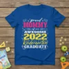 Proud Mommy of an Awesome 2022 Kindergarten Graduate text design on a blue t-shirt, featuring celebratory graphics and year details