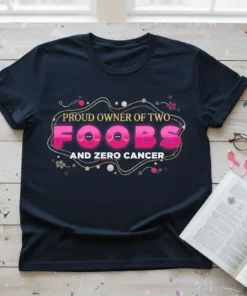Proud Owner of Two Foobs and Zero Cancer t-shirt with pink and white text and decorative elements