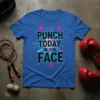 Bold black text "Punch Today In The Face" on a blue t-shirt with pink and turquoise abstract splatters and graphic