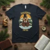 Punxsutawney Phil day t-shirt with a cartoon groundhog wearing a top hat and suit, set against a mountain and sun