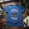 Blue t-shirt with "Pure of Heart Dumb of Ass" text and a donkey graphic. Japanese text also present