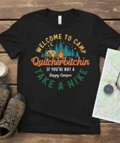 Black t-shirt with "Welcome to Camp Quitcherbitchin If You're Not A Happy Camper Take A Hike" text, RV, campfire, and