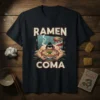 Ramen Coma T-Shirt featuring a muscular sumo wrestler holding a large bowl of ramen, with text "RAMEN COMA" above and