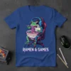 Ramen & Games T-Shirt featuring a cartoon frog in a gaming chair eating ramen