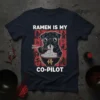 Black pug eating ramen noodles with chopsticks on a t-shirt with Japanese text, "Ramen Is My Co-Pilot" slogan