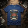 Raymond The Man The Myth The Legend quote t-shirt with shield, wings, and lion graphics