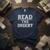 Navy blue t-shirt with white text reading "READ THE INSERT" in a bold, block font
