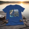 T-shirt design with text "REEL COOL DAD" and a jumping bass fish graphic, suitable for fishing enthusiasts