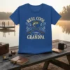 Reel Cool Grandpa fishing t-shirt design featuring crossed fishing rods, a fish, and anchors