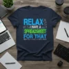 T-shirt with the text "RELAX I HAVE A SPREADSHEET FOR THAT" in blue and green, featuring graphic elements related to